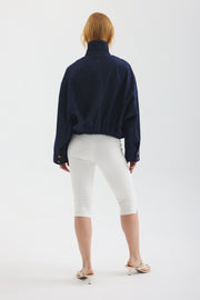 Model showing back of Blue Jay jacket in Indigo