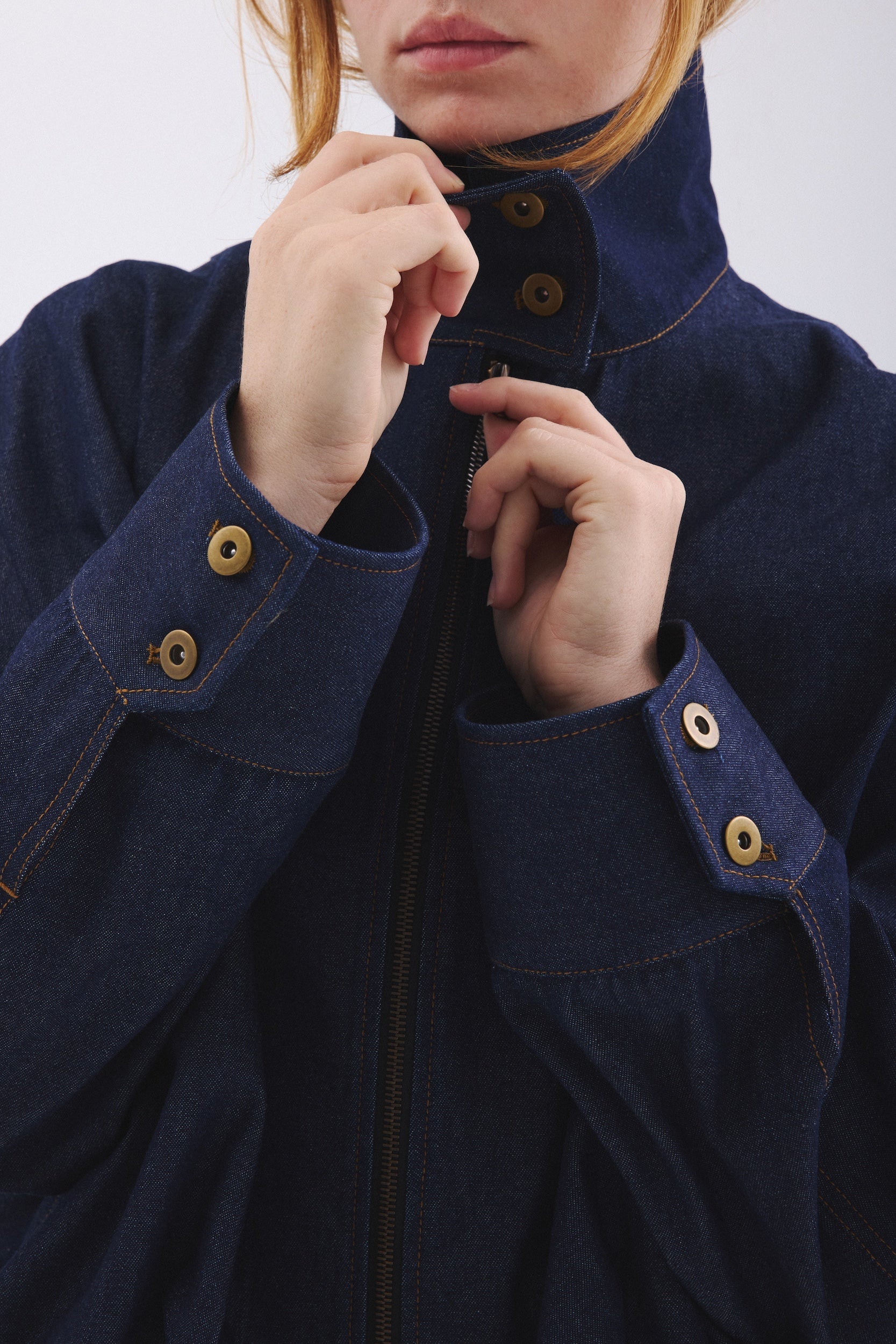 Closeup of cuffs and neckline of Blue Jay jacket in Indigo