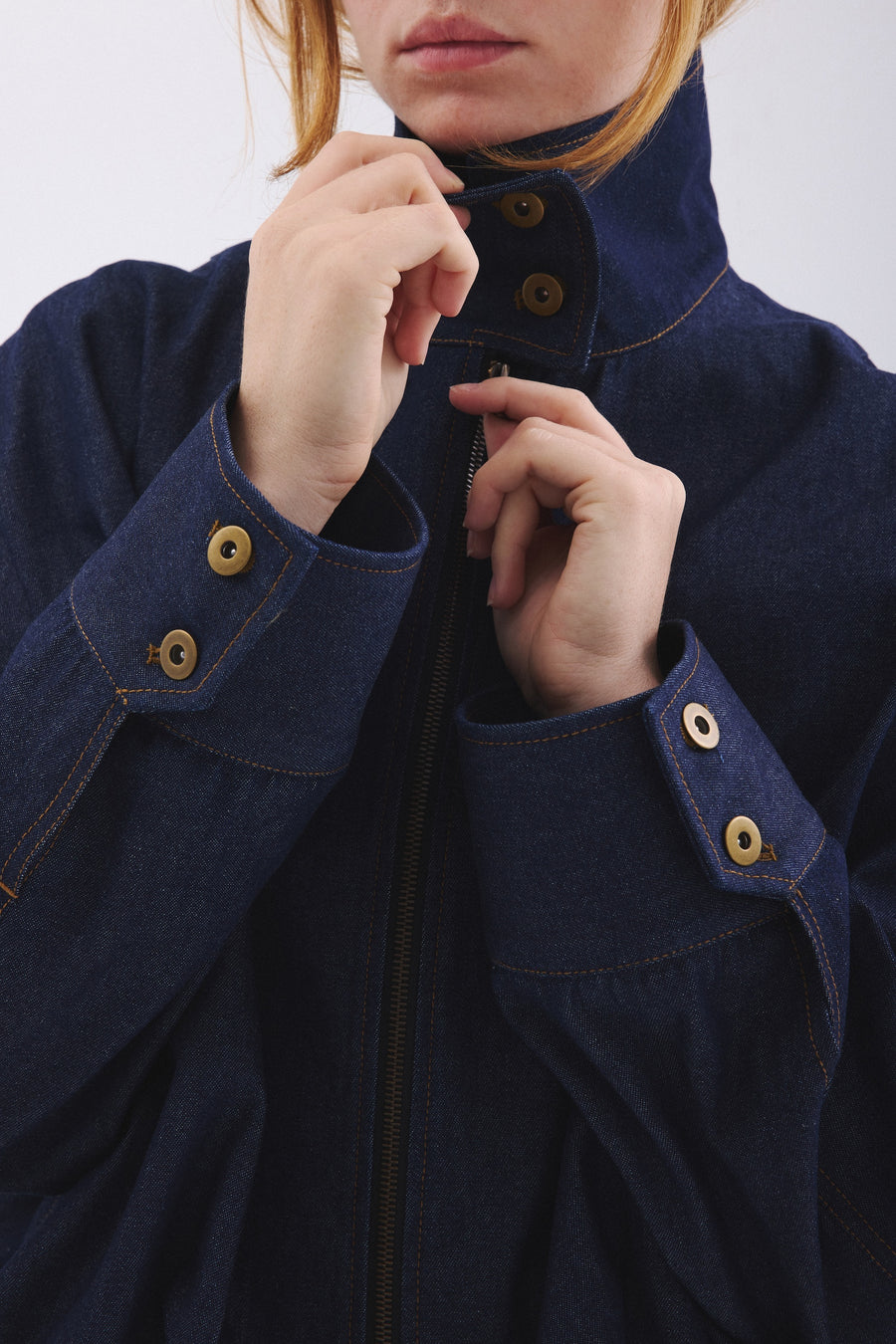 Closeup of cuffs and neckline of Blue Jay jacket in Indigo