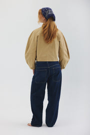 Model showing back of sand colored Palmetto jacket